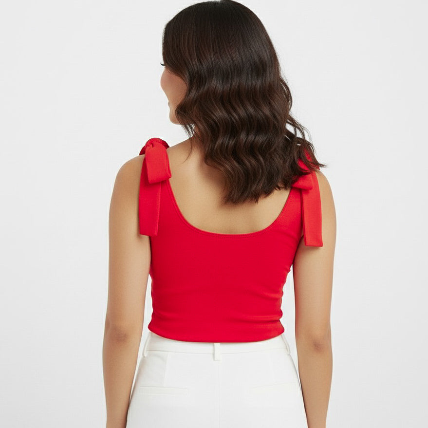 Back view of woman wearing a Red bow-shoulder bodysuit from Motch, part of a matching mommy-and-me outfit set, highlighting the clean scoop-back design and bow details.